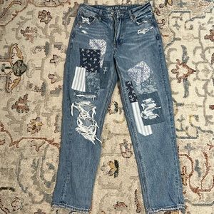 American eagle ripped jeans. Patch detailing. Size 2. Color is blue jeans